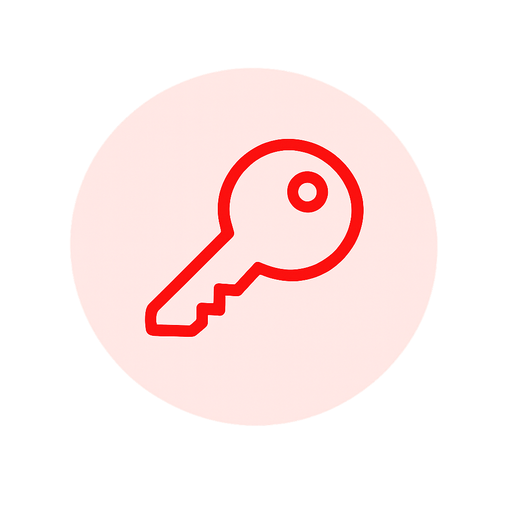 Minimalist flat design key icon A simple lineart key in solid red ED1C24 with a rounded head and a short shaft with a single tooth detail The key is c